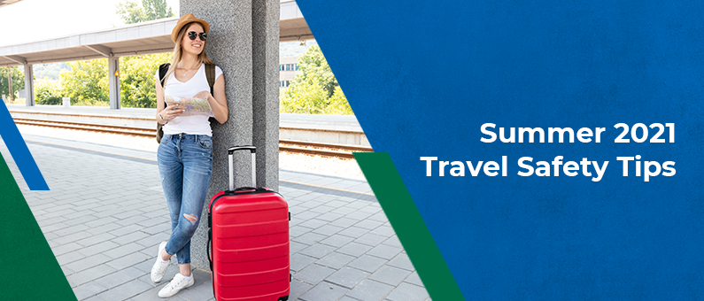 Summer 2021 Travel Safety Tips - Woman with luggage standing at a train station holding a map 